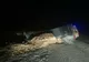 Autocamion încărcat cu cherestea, răsturnat în afara părții carosabile