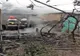 FOTO O casă a luat foc din cauza unui scurtcircuit electric. O femeie în pericol