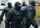 VIDEO Percheziții în Ialomița. Dețineau ilegal arme și muniții și au fost săltați de mascați
