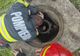 FOTO Ied salvat după ce a căzut într-o fântână. Pompierii l-au resuscitat